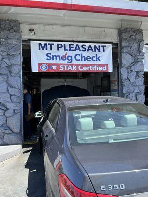 Smog check at a gas station