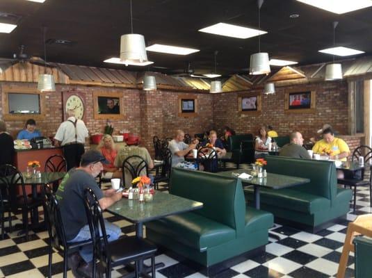 The seating area is clean, the tables are not dirty and not sticky