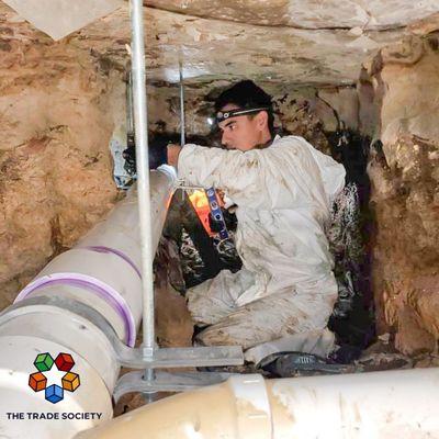 Hard at work beneath the surface! Our expert plumber tackles a challenging under-slab drain replacement.