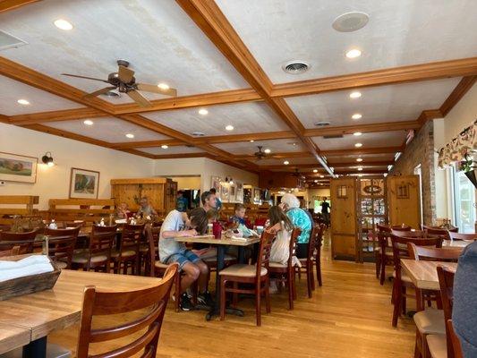 Nice interior with plenty of outside seating as well against beautiful green cliffs