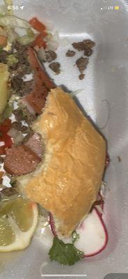 It's is a torta from this place, there is a hair in the side of the torta