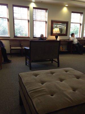 The huge ottoman in the waiting room is beloved by children.