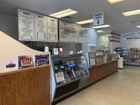 Front counter where fresh, made to order magic happens. Menu also includes: drinks, fresh made sides, and chips.