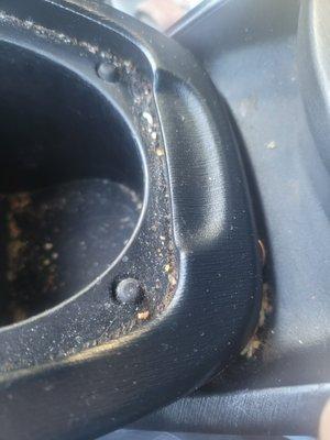 Dirty cup holders after their cleaning