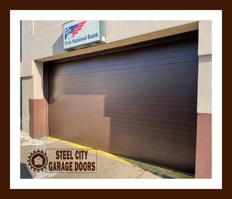 Commercial garage door in chocolate finish light ribbed