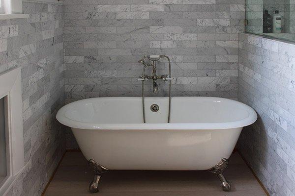 Carrara Marble Subway Tile Antique Tub Surround, South Pasadena, by Ceramic Finishes.