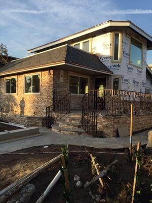 New construction project in Los Angeles - new flagstone , new ledger stone at front of house .