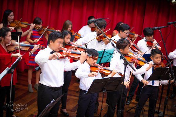 Christmas concert featuring our string orchestra at Ala Moana Centerstage