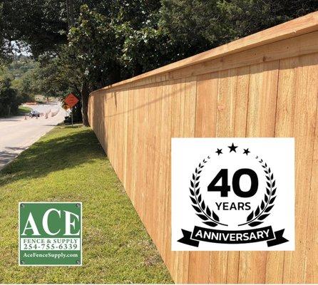 40 Year Anniversary over a Wood Privacy Fence with Top Cap and Trim