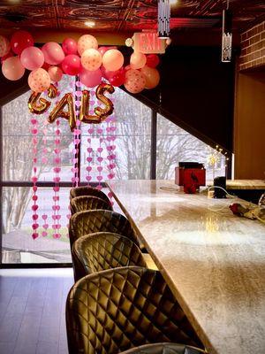 bar area & additional seating photo backdrop  for Galentine's Day brunch buffet 2024