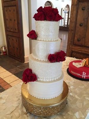 Beautiful wedding cake with various flavors (red velvet, vanilla, italian coconut). Delicious per usual!