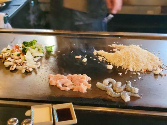 Hibachi being cooked in front of us.