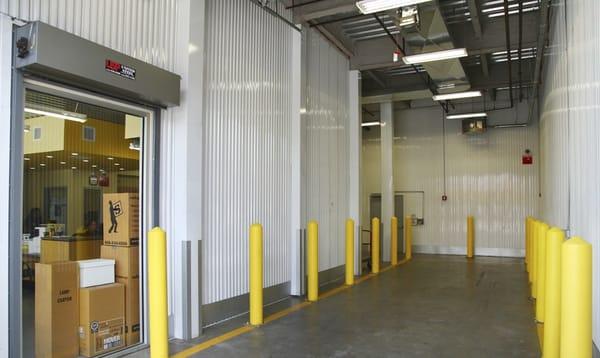 Drive-in loading bay to protect your items from the weather while moving into your storage unit.