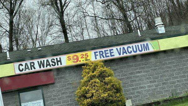 20 foot long sign says FREE VACUUM.