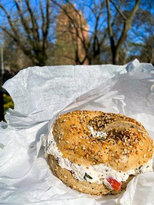 Whole wheat bagel w/ horseradish cream cheese. Al fresco comfort in the park