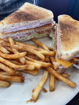 Club sandwich and fries