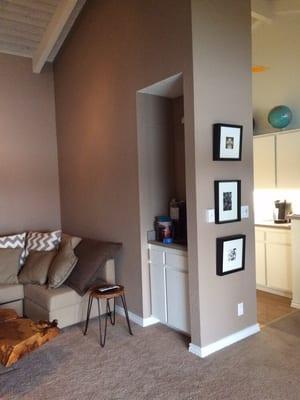 The livingroom re-painted. Also, the pictures hung perfectly spaced out and level.