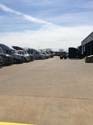 Lot where trucks await servicing.