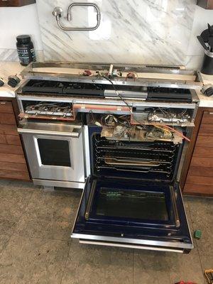 We do fix also Wolf appliances.  On Photo you can see process of replacing main computer board due to not working light inside big oven.