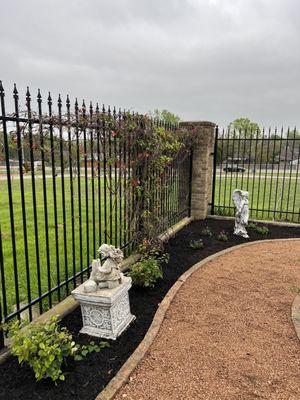 After Picture! Restored walkway; Added plants and greenery; and added new weed barrier and Mulch!