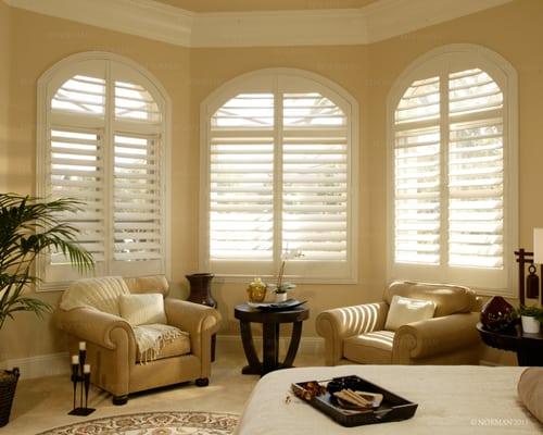 Norman Plantation Shutters with Arched Panel