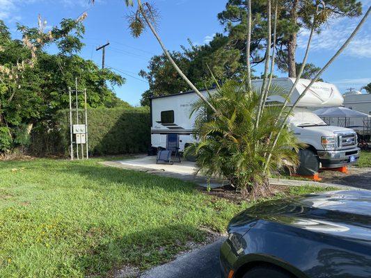 The other side of my RV has an entire grass section with a beautiful patio. I could not be more happy in this situation