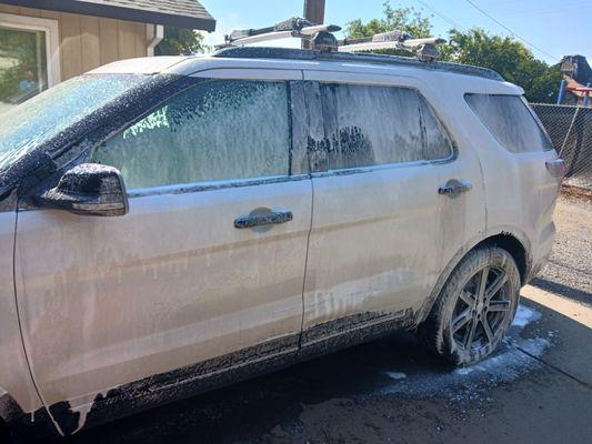 Ford Explorer is getting a foam bath by Liberty Detailing