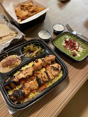 Chicken skewers, pesto dip