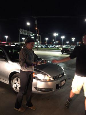 He handed her the keys to her first car. She thought he was cute so we arrange for him to hand her the keys