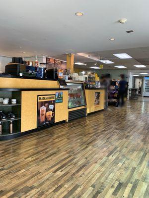 Front counter ordering with groceries available for purchase as well