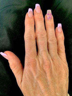 Acrylic nail fill, French tip in lilac color with nail art