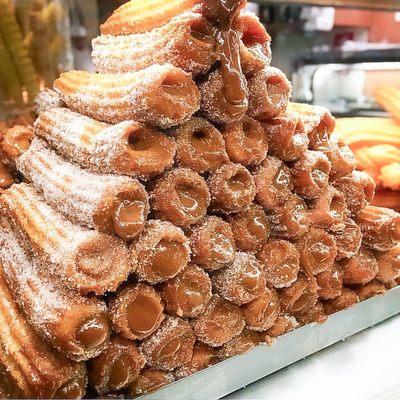 A mountain of churros doused in cinnamon and sugar