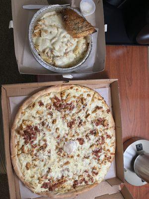 Chicken Alfredo pasta and a Medium choose your own pizza, with chicken bacon and Alfredo sauce.