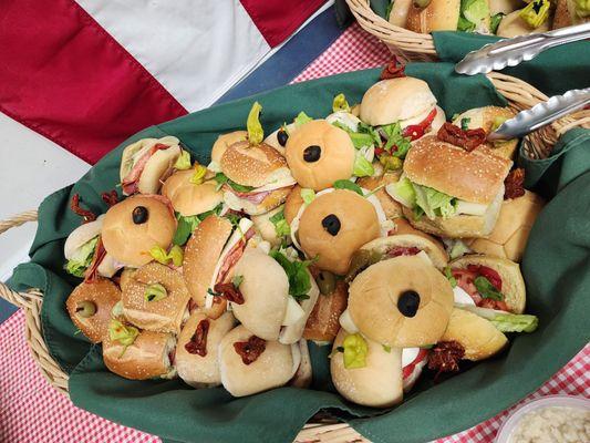 Assorted sandwiches, vegetarian option also caprese with fresh  mozzarella. Delicious.