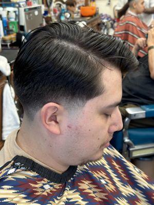 Gentlesmens haircut with a taper