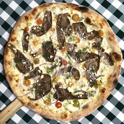 Rotating Pizza Lab: "Gyro Hero"

Tzatziki sauce base with aged mozz, lamb & beef gyros, heirloom tomato, pickles, red onion, feta & dill.