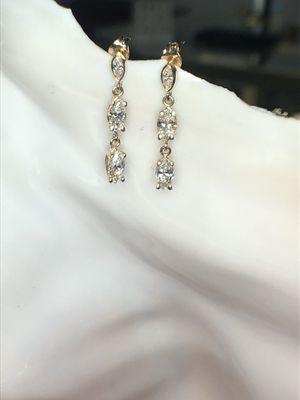 Yellow gold diamond drop earrings.