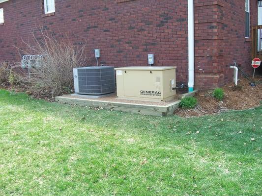 We built the landscape timber box filled with gravel for the generator as well as the A/C unit