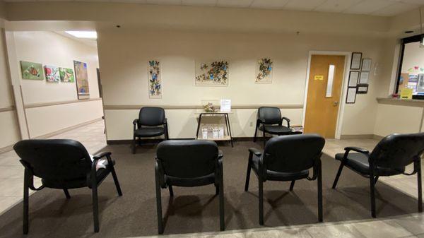 Patient waiting area near checkout.  I love the butterflies!