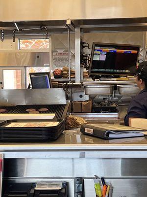 Those burgers on the grill are ours the one next to the grill is the stock pile.