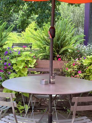 Outdoor patio with beautiful plantings