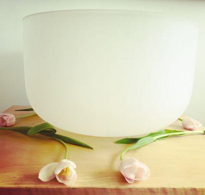 Sound bowl used during Guided Relaxation in Savasana/resting pose after meditation