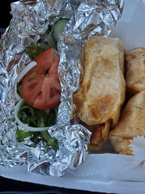 2 tandoori rolls with 'salad' instead of fries. Rolls are about the size of small Asian spring rolls