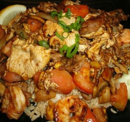 Banker Combo: Stir fried chicken, beef, shrimp, onions, tomatoes and mushrooms. Served over fried or steamed rice.