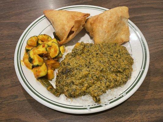 Saag paneer, vegetable samosas, and zucchini curry