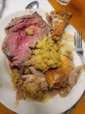 Rara prime rib, dark meat turkey and skin, stuffing, mashed potatoes, and fried chicken (1st plate of several trips )