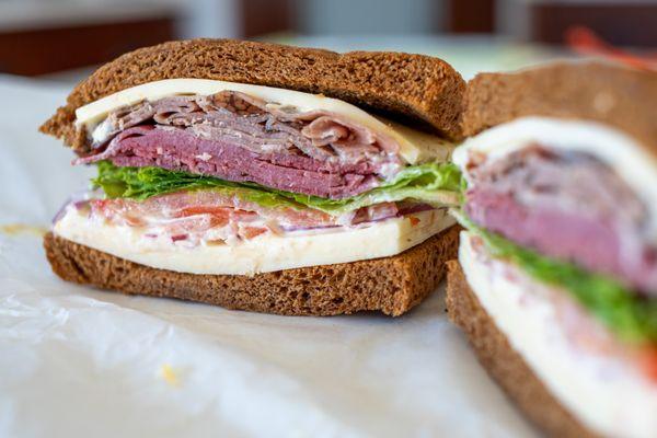 Eau Claire Special - Roast Beef and spicy Pastrami & Hot Pepper Cheese served on Pumpernickel with Lettuce, Tomato, Onion and Special Sauce