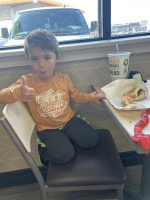 My son eating at his favorite subway! He's happy I promise hahaha.