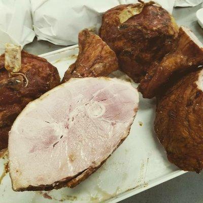 Smoked ham cut in half with the smoked hock.