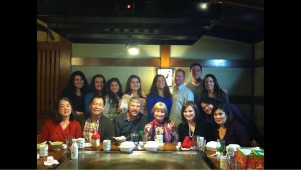 Dr Wong and staff with their spouses.